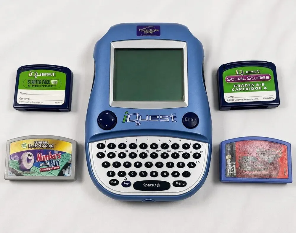 LeapFrog iQuest Handheld Learning System w/ 4 Game Cartridges Tested Works